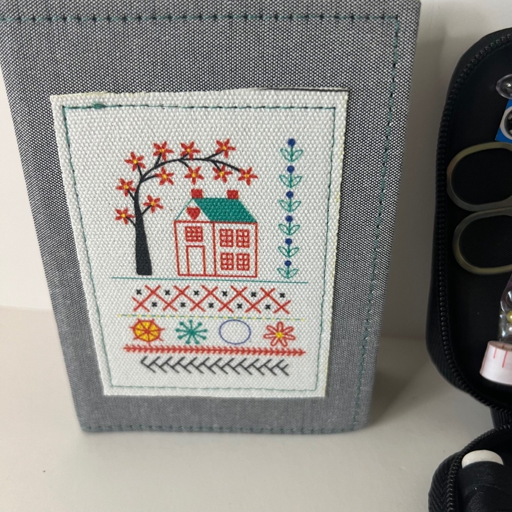 Compact Gray Sewing Kit with Multicolor Thread & Tools - Picture 2 of 8